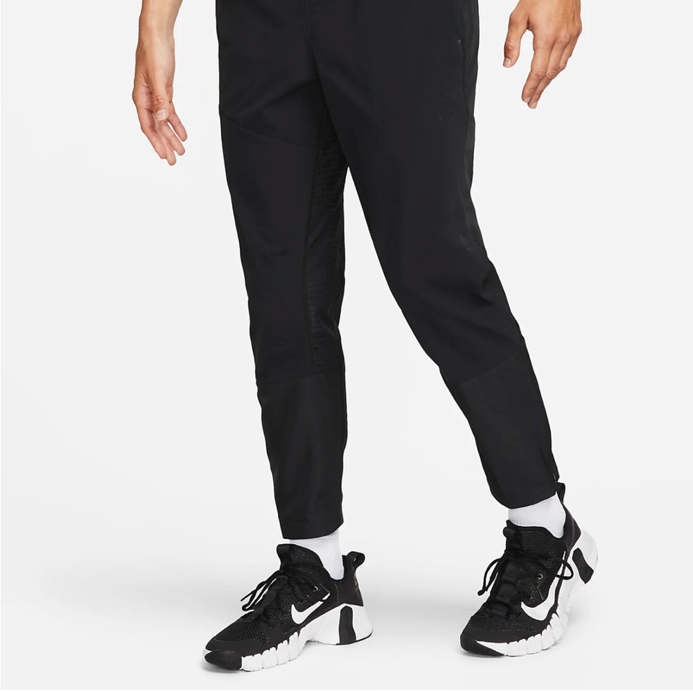 Nike A.P.S.
Men's Dri-FIT ADV Woven Versatile Pants
